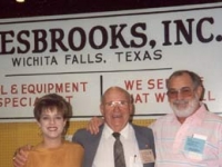 Marshall Hamilton of Hamilton Tires with Lori Wesbrooks Stone and Bob Wesbrooks at the 1993 NTDRA Tire Show in Orlando.