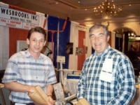 Ed Kuhn, President and CEO of TravelCenters of America and a friend stop by the Wesbrooks booth for some peanuts at the TA Trade Show in Nashville in 1995. Ed is our best peanut customer!