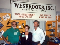Bob Wesbrooks, daughter Lori, and Dave Latimer, Petro Lube Operations Manager, at the NTDRA Tire Show in Las Vegas in 1992.